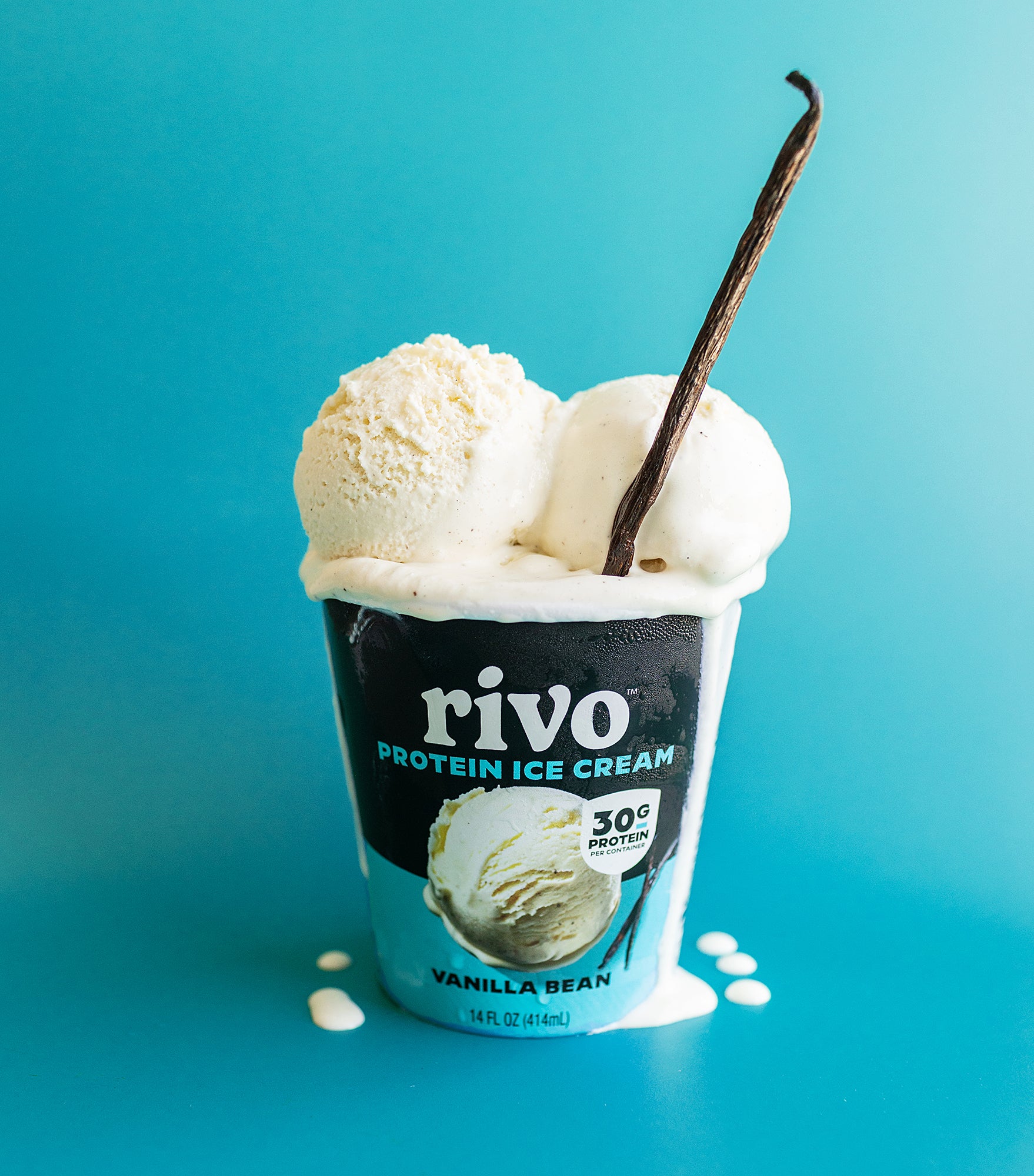 Rivo Vanilla Bean protein ice cream container with vanilla bean flavor on a blue background