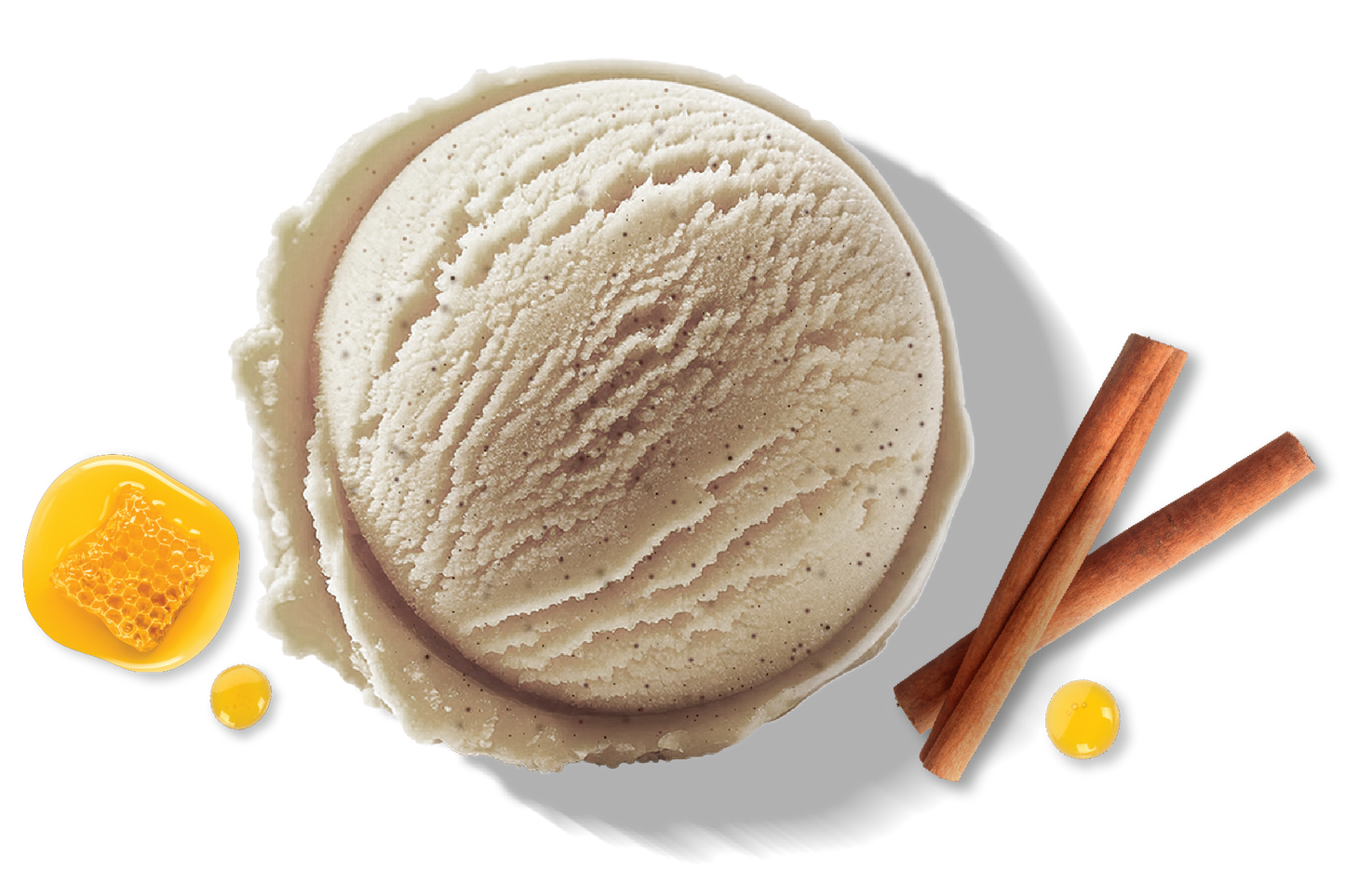 A scoop of Rivo Honey Cinnamon protein ice cream with honey and cinnamon sticks.