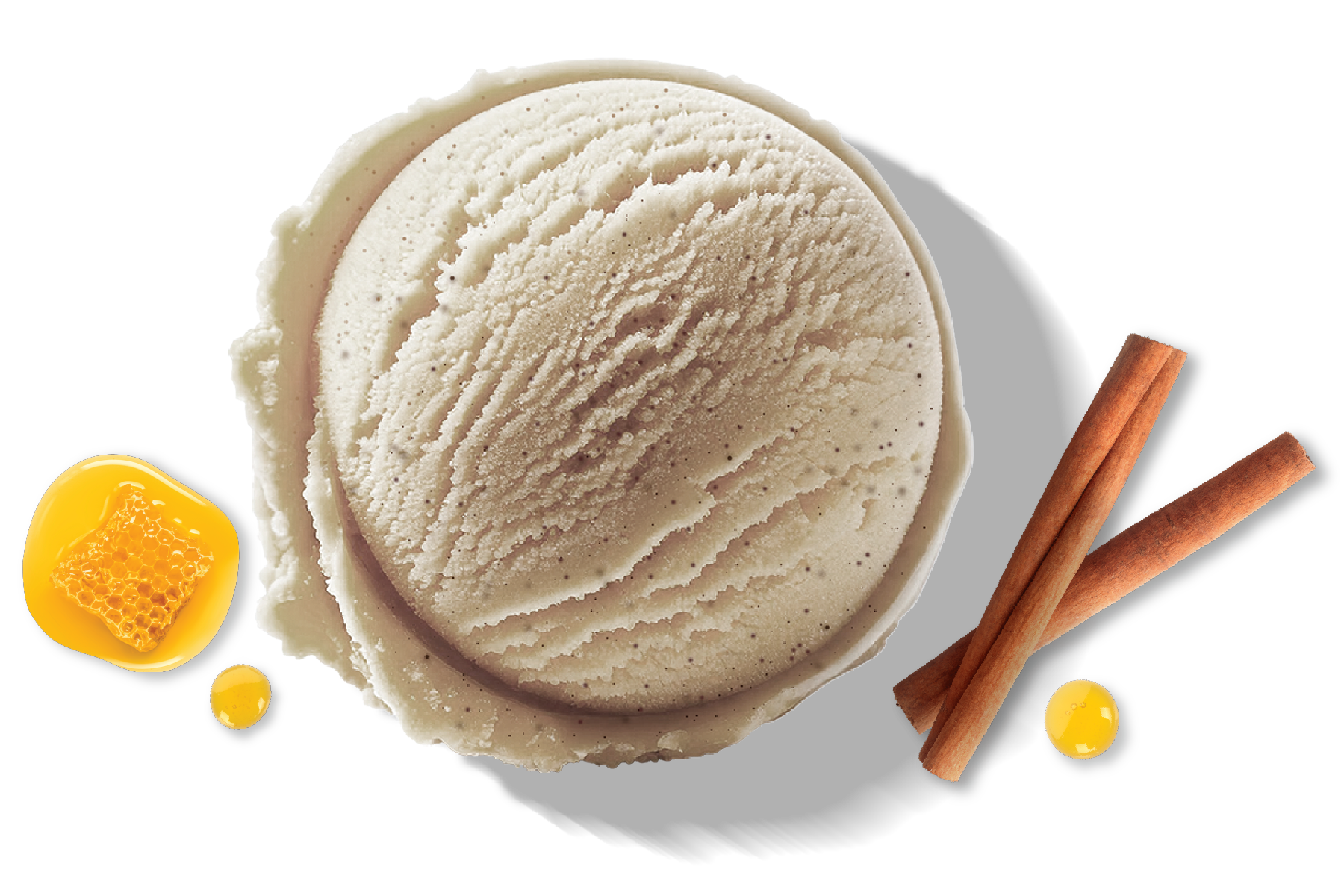 A scoop of Rivo Honey Cinnamon protein ice cream with honey and cinnamon sticks.